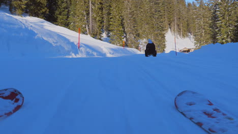 ski area in the swiss alps with people and chairlifts in the winter ski area of beckenried