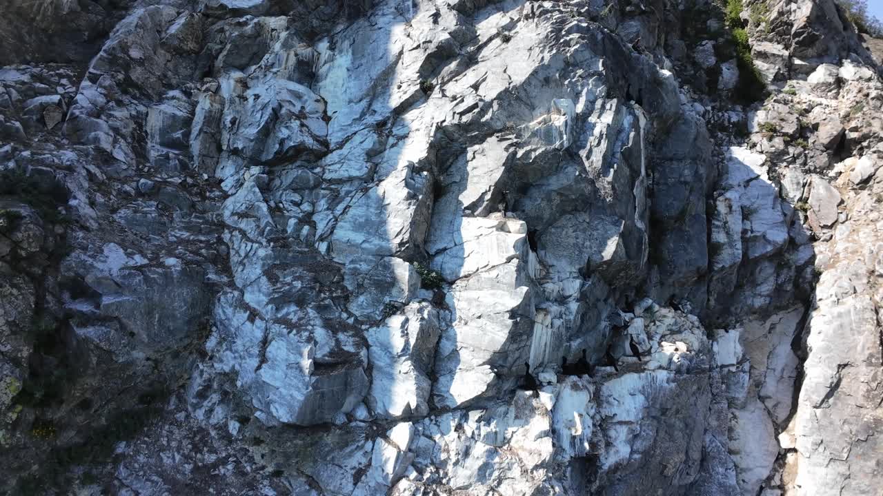 Explore a stunning rocky landscape from above, revealing nature's vast beauty