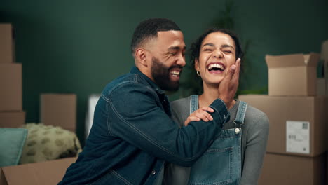 couple celebrating moving into their new home
