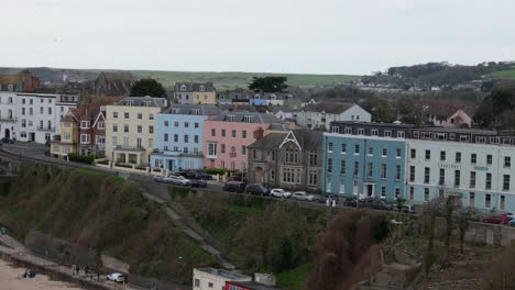 typical welsh sandy beaches and colourful houses in tenby harbour, united kingdom