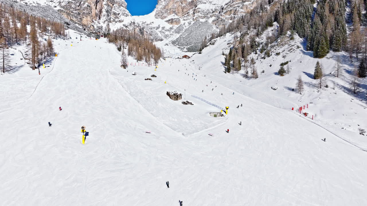 Aerial drone view of the Colfosco ski resort in South Tyrol, Dolomites, Northern Italy