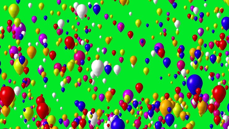 Palloncini multicolori che volano su schermo verde