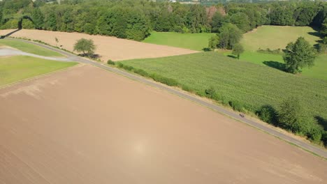 cyclist riding a bike through the countryside