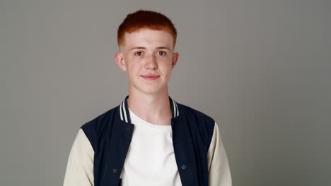 portrait of red head caucasian teenage man