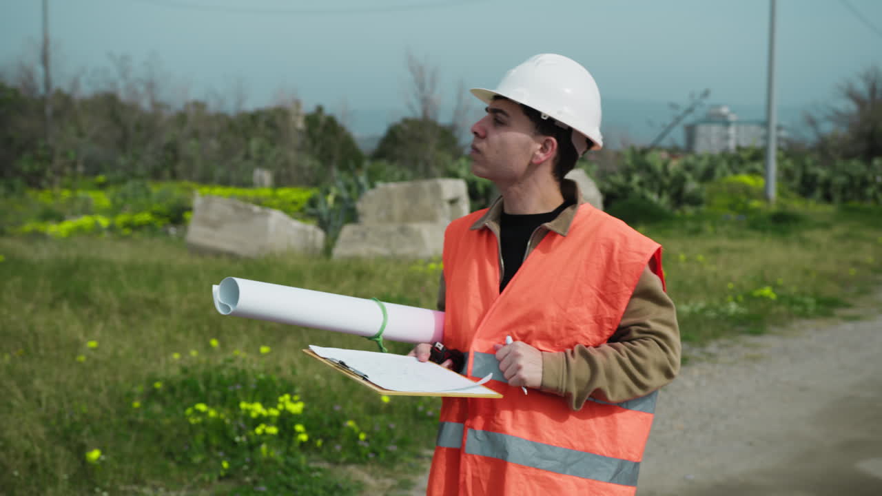 Architect Taking Notes While Walking On The Construction Site And Looking Around