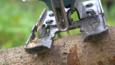 cutting wood with power jigsaw