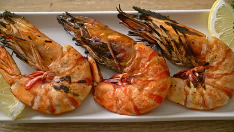 grilled tiger prawns or shrimps with lemon