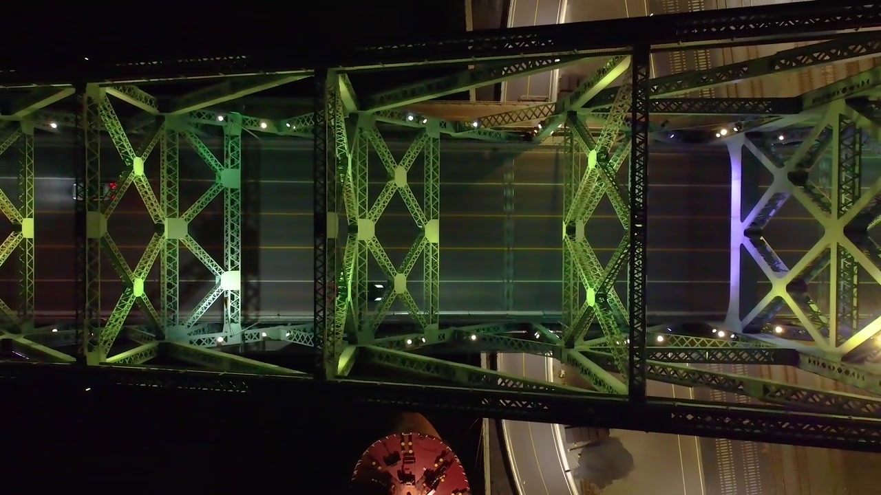 Traffic over industrial Jacques Cartier bridge in Montreal. Aerial view
