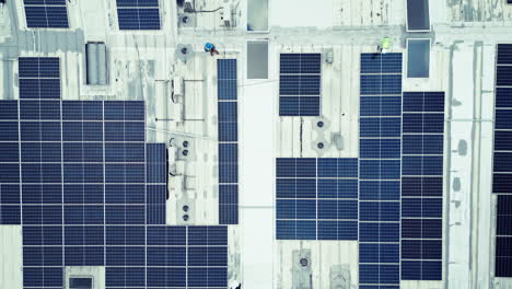 Aerial,-solar-energy-and-a-construction-worker
