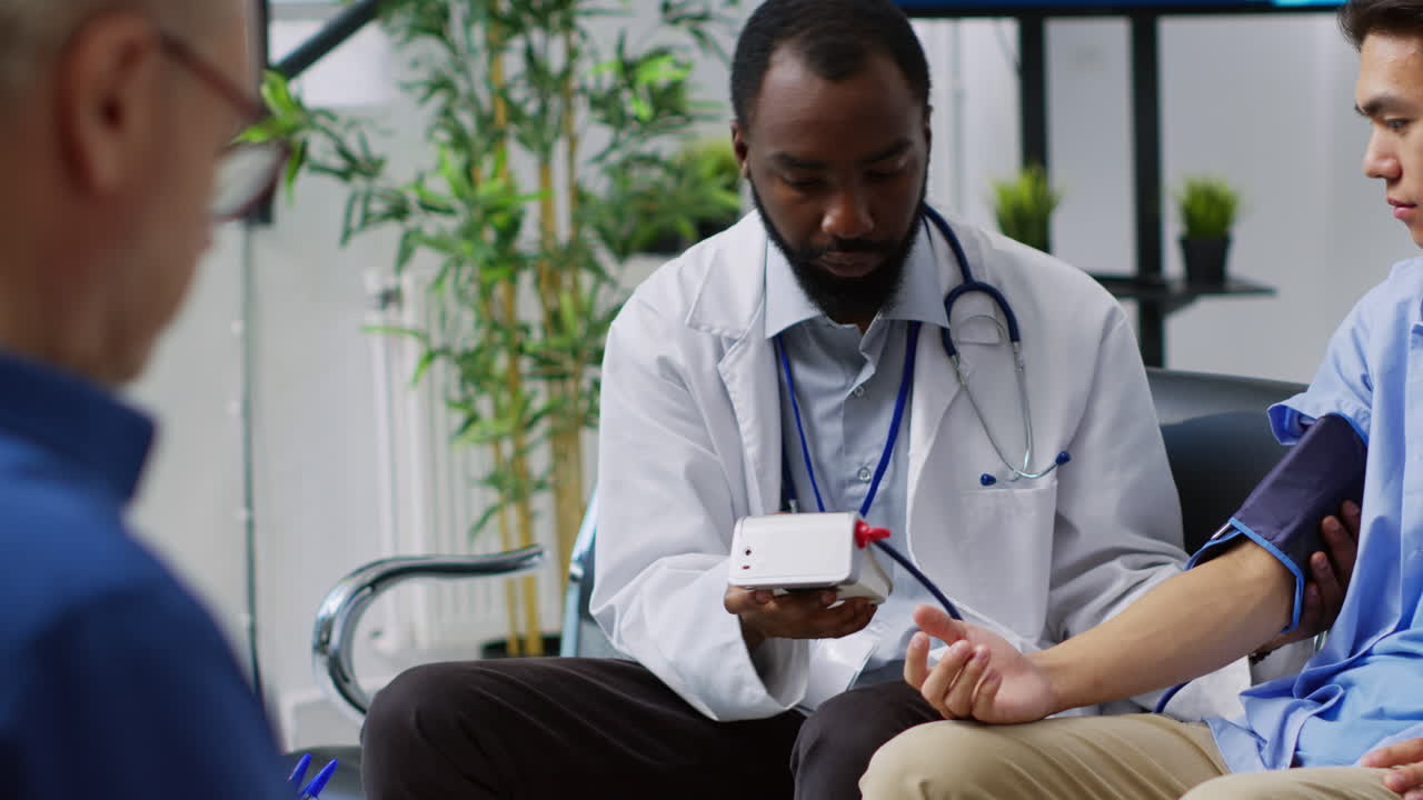 Doctor Checking Patient's Blood Pressure