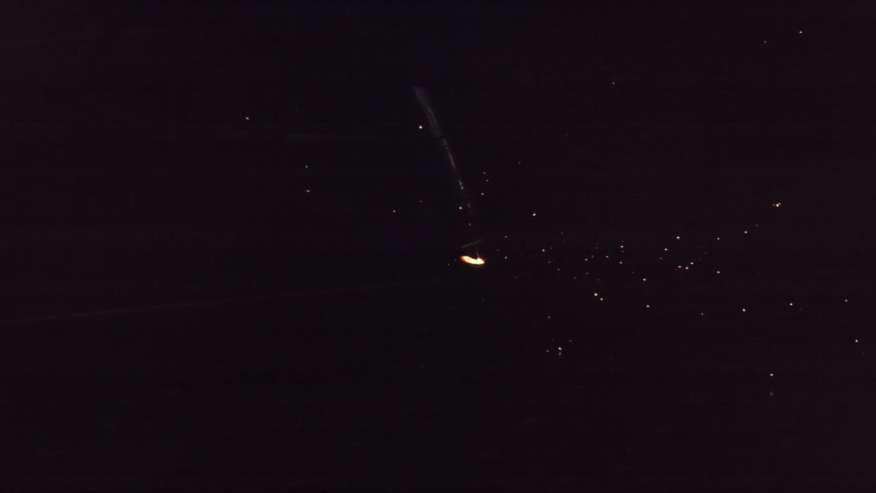 Welder Welding together two steel pipes.Super Slow Motion working