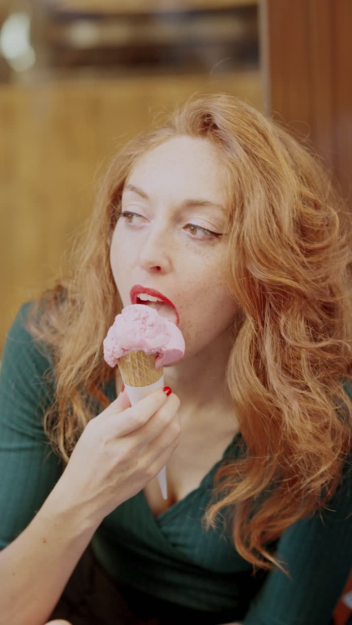 Woman Enjoying Ice Cream Outdoors with a Friend
