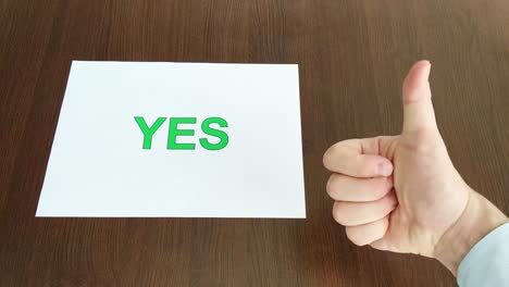 yes sign on a white paper