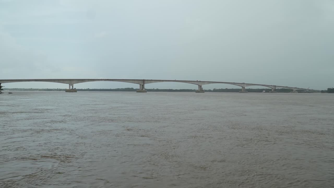 Batang Lupar Sarawak River Ferry Ride View During Summer And Under Construction Longest Bridge Conecting From each side,Sarawak,Borneo.