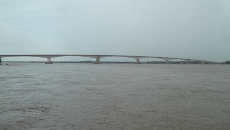 batang lupar sarawak river ferry ride view during summer and under construction longest bridge conecting from each side,sarawak,borneo.