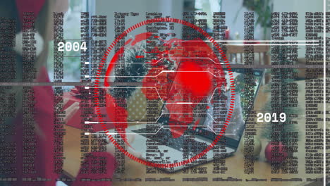 red digital globe and data processing animation over office desk with computers
