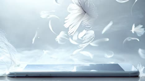 a white phone with a pile of white feathers surrounding it. the feathers are scattered all over the phone, creating a sense of chaos and disarray. the scene evokes a feeling of messiness and disorder