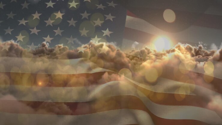 Animation of glowing spots and sun shining on sky with clouds over american flag
