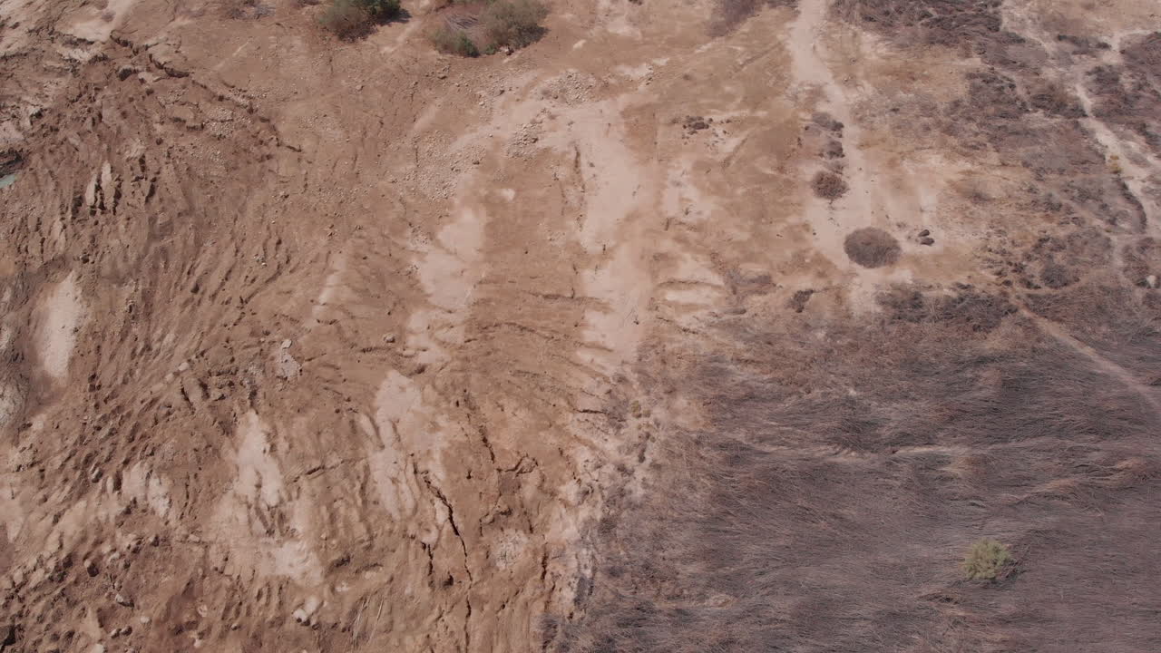 Drone flying over sinkholes and the dead sea
