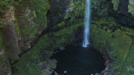 aerial view of amidaga-taki falls, mossy and lichen covered cliffs from above