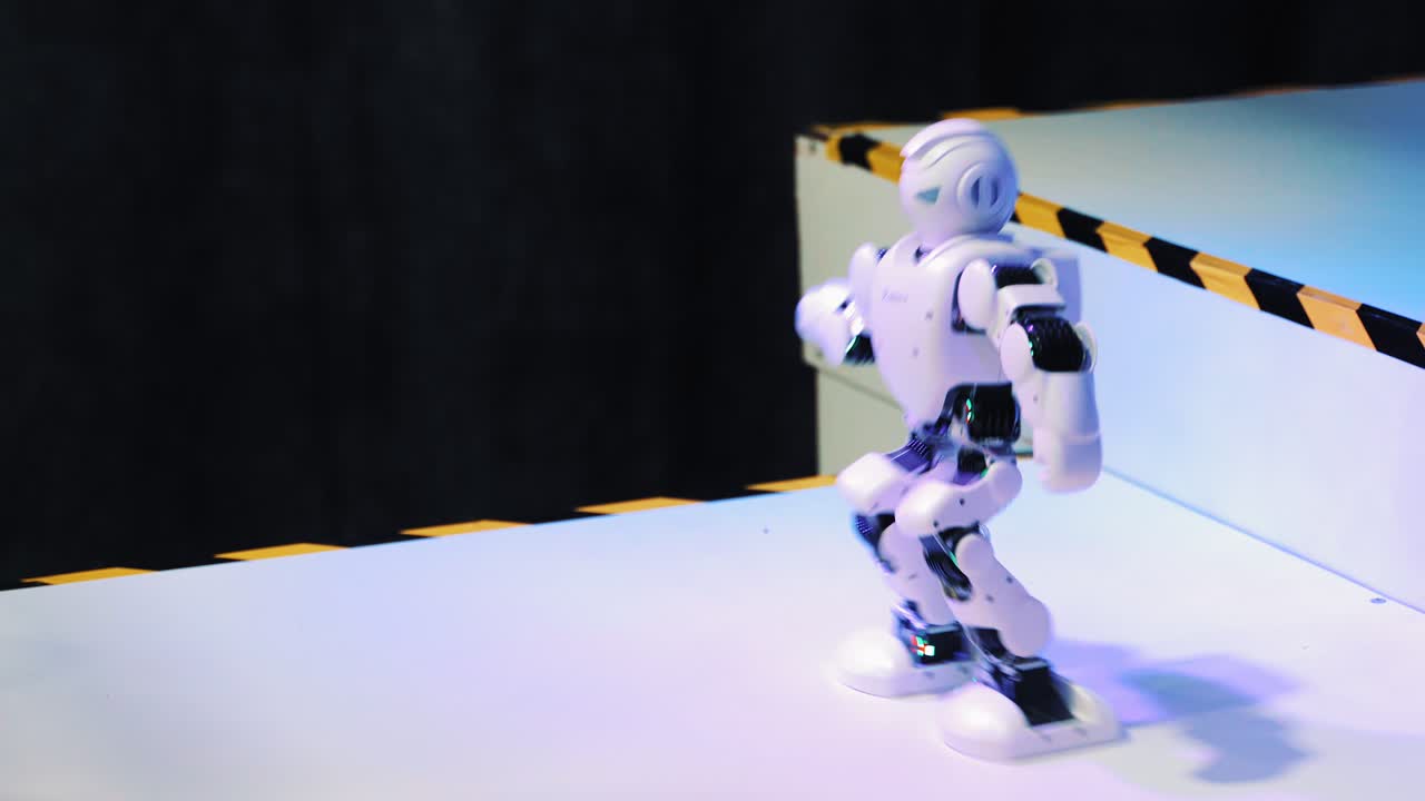 Dancing robot close up. Smart technology concept. Closeup of smart robots dance. Robotic dance party. Dancing robot humanoid. Dancer robot man