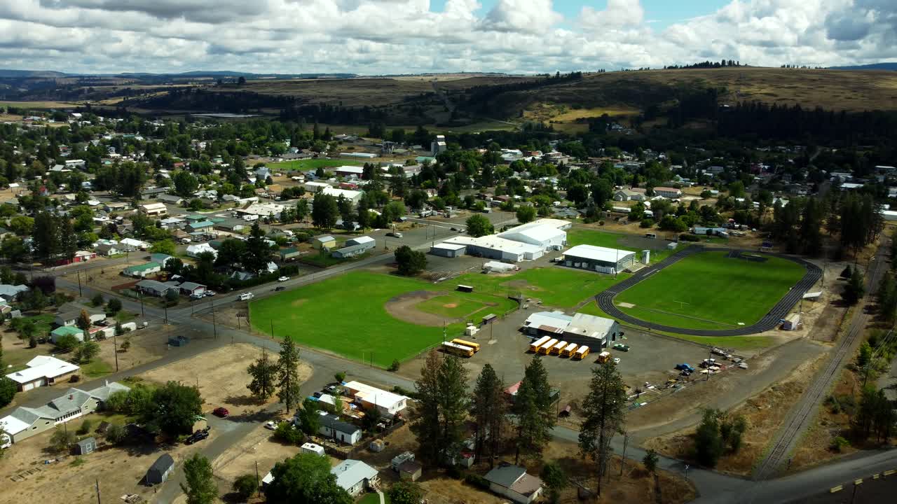 US, Oregon, Elgin, 2025-08-07 - Drone view of Elgin High School in summer