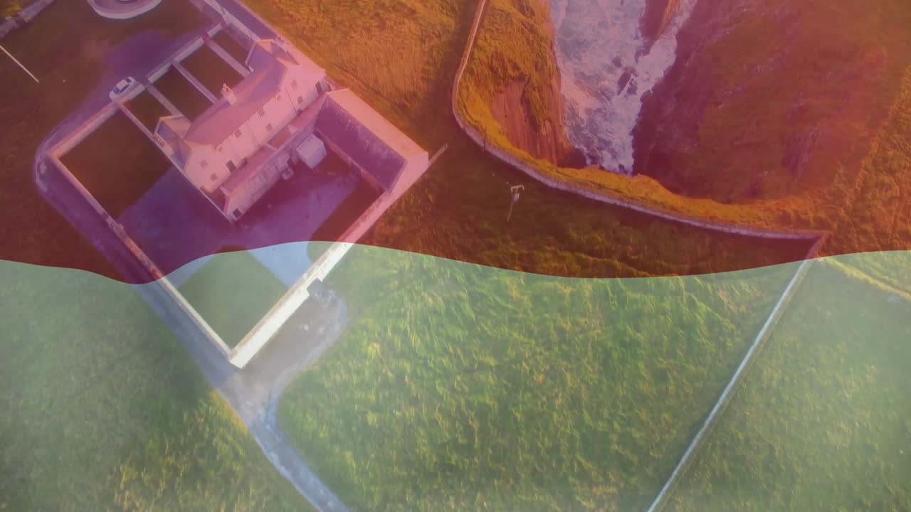 Animation of colorful buildings and winding paths in landscape from above view