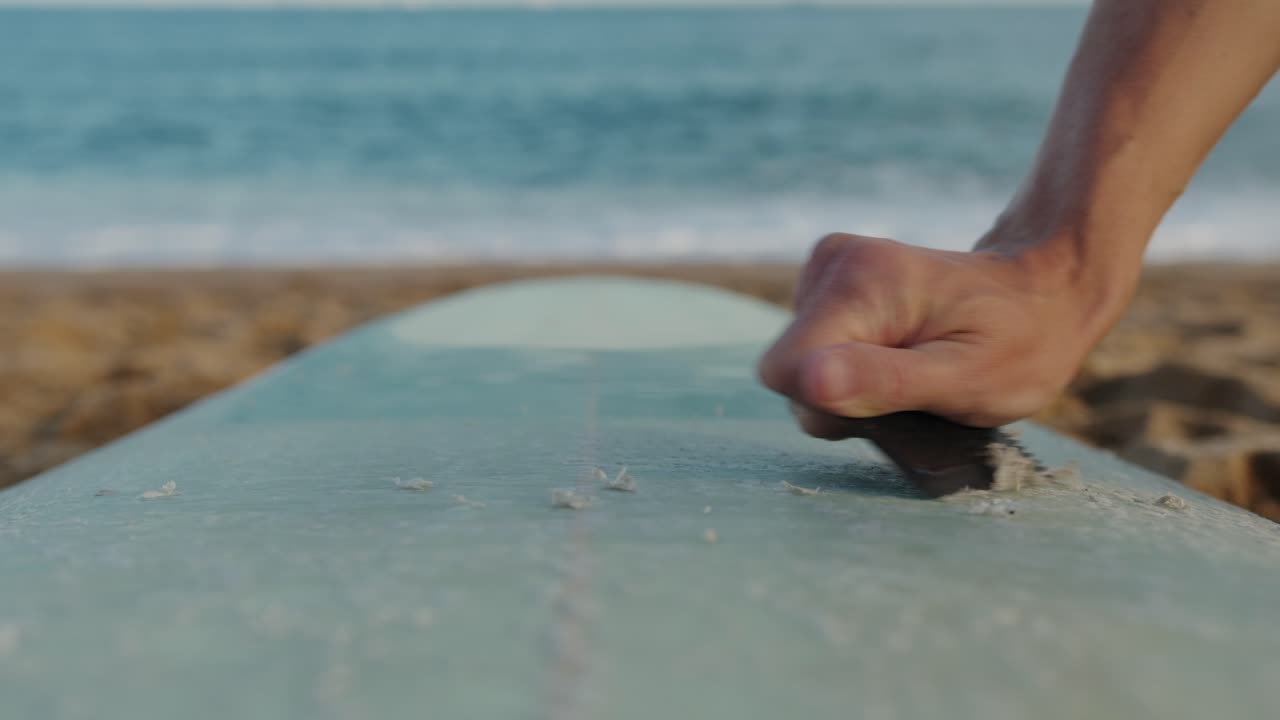 Surfer man walking to the beach at sunset preparing for surfing training and search for waves in Barcelona, spain, water, ocean exercise in sea with board, athletic male holiday or travel in vacation
