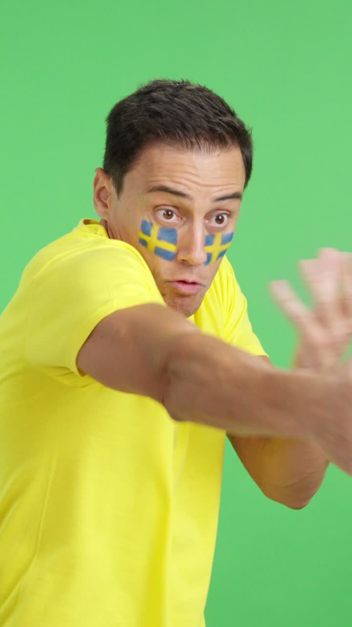 Man cheering for Sweden, angry with the decision of referee