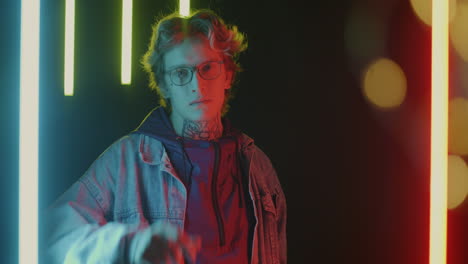 stylish young man in neon lights