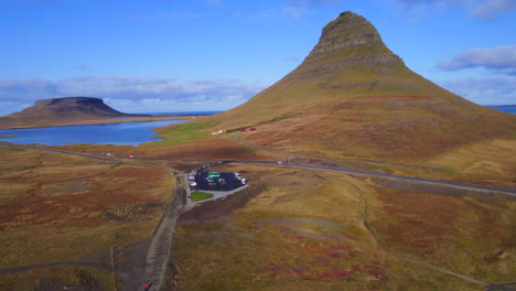 tourists visiting kirkjufell famous mountain on iceland’s snæfellsnes peninsula