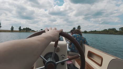 pov shot of a sailor sails small boat through biesbosch on sunny day netherlands