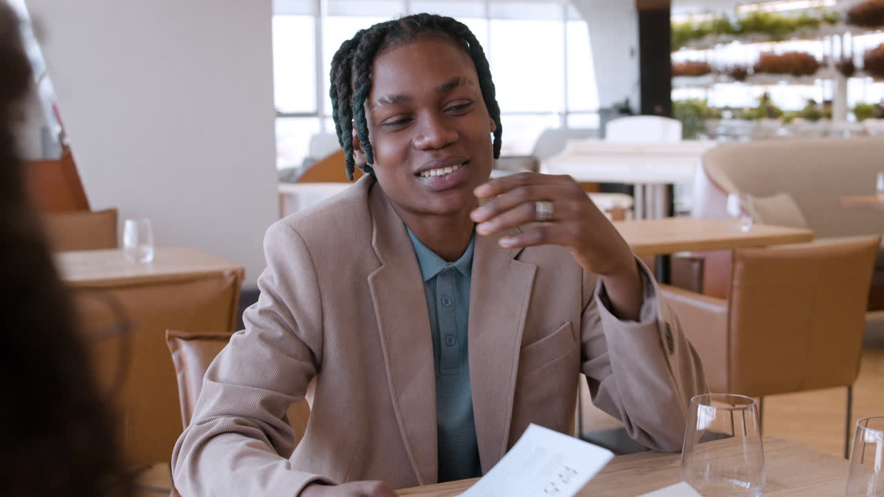 Business Meeting in a Modern Restaurant