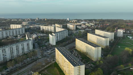 aerial view of rows of brutalist tower blocks in zabianka neighbourhood in city of gdańsk, poland