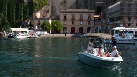 a boat cruising in sorrento's scenic harbor