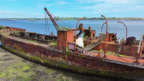 ireland epic locations wexford rusting abandoned boat, at rest in saltmills wexford on a summer day