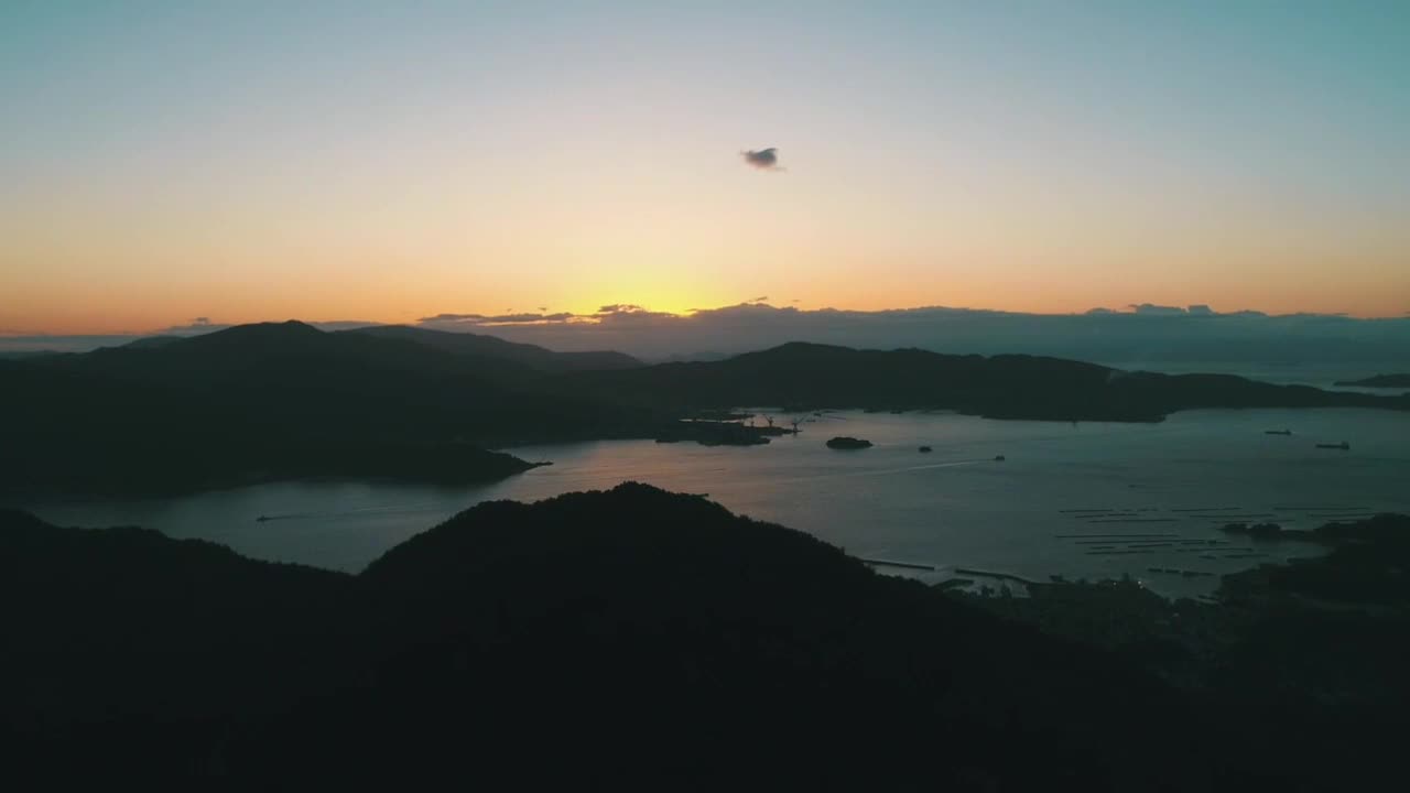 Mountains and Sea at Sunrise