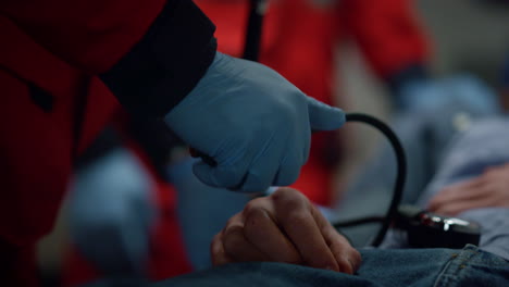 male victim lying on stretchers in ambulance car