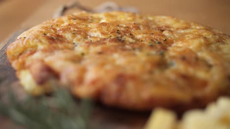 traditional slovenian cheese omlette, lefd pan, shallow depth of field, closeup