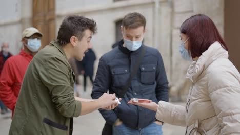 street magicians performing card tricks