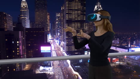 woman using a vr headset on a balcony overlooking a city at night
