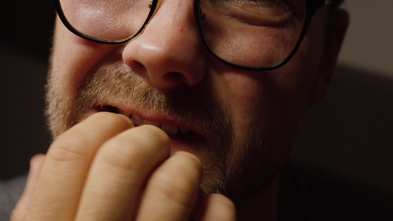 Nervous Habit Reflecting Anxiety, Stress or Deep Thought in Personal Moment of Tension