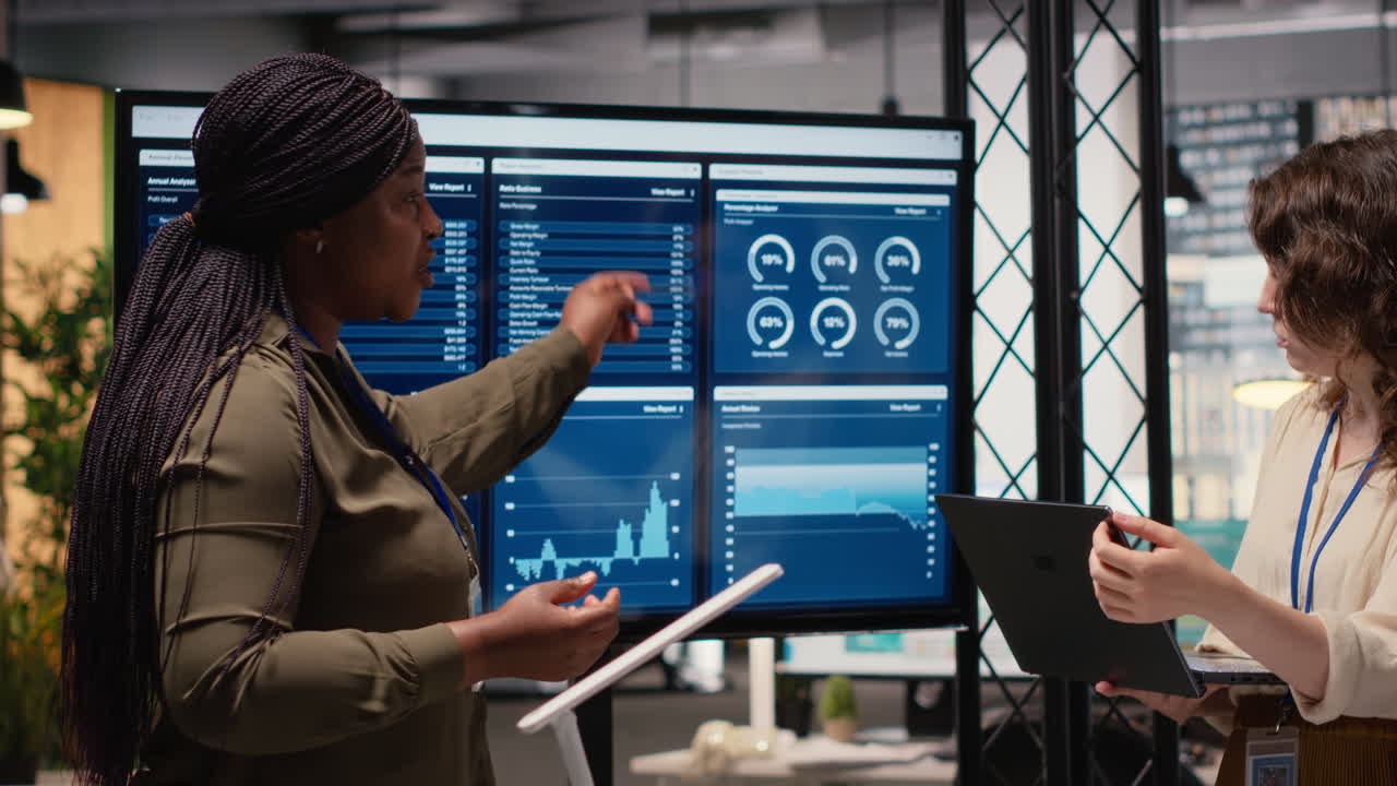 Vertical Video Diverse group of women discusses project development and report indicators