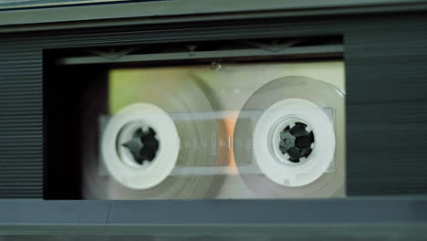 vintage cassette tape inside a tape player