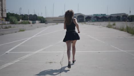 woman running in a parking lot