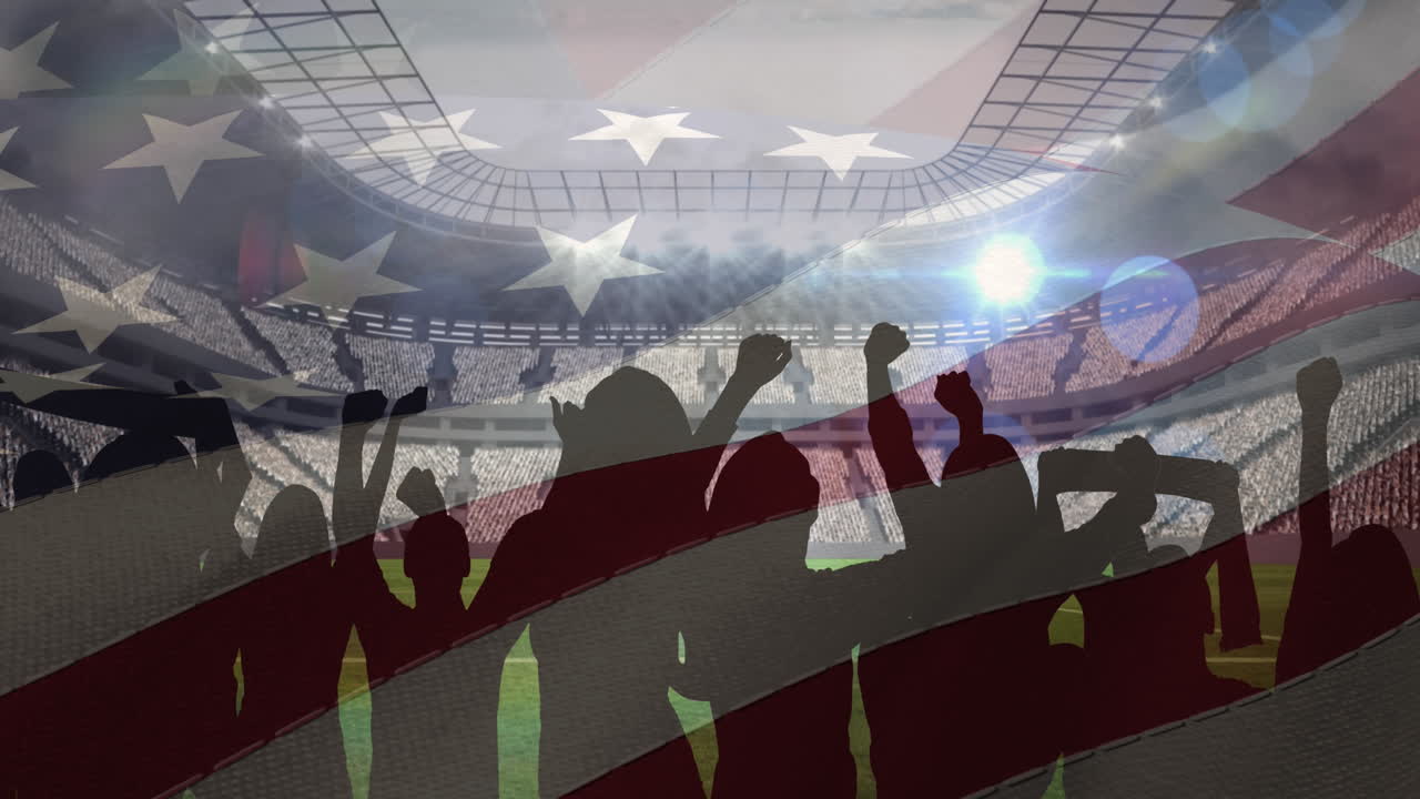 Waving american flag against silhouette of fans cheering and sports stadium in background