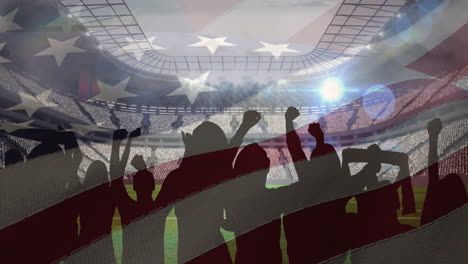 ondeando la bandera estadounidense contra la silueta de los fanáticos aplaudiendo y el estadio deportivo en el fondo