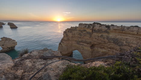 portugal algarve sunrise slider revealing cliff sunny day