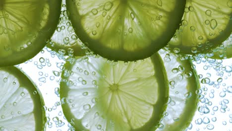 lime slices in sparkling water