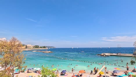 tourists enjoying a sunny beach day